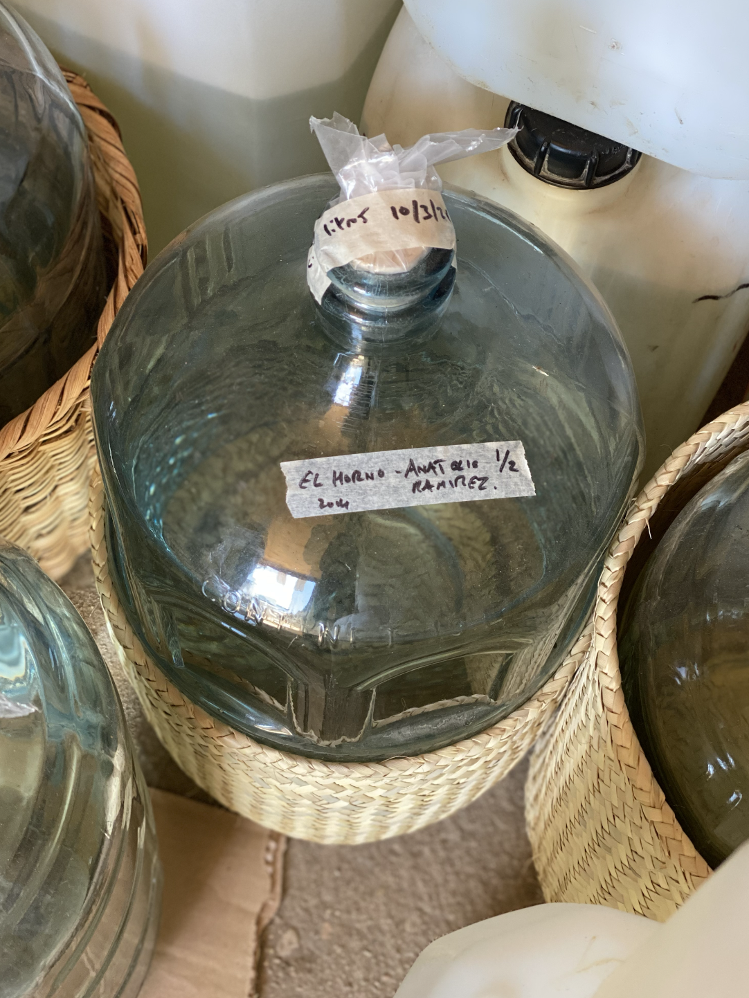 glass bottle full of mezcal 