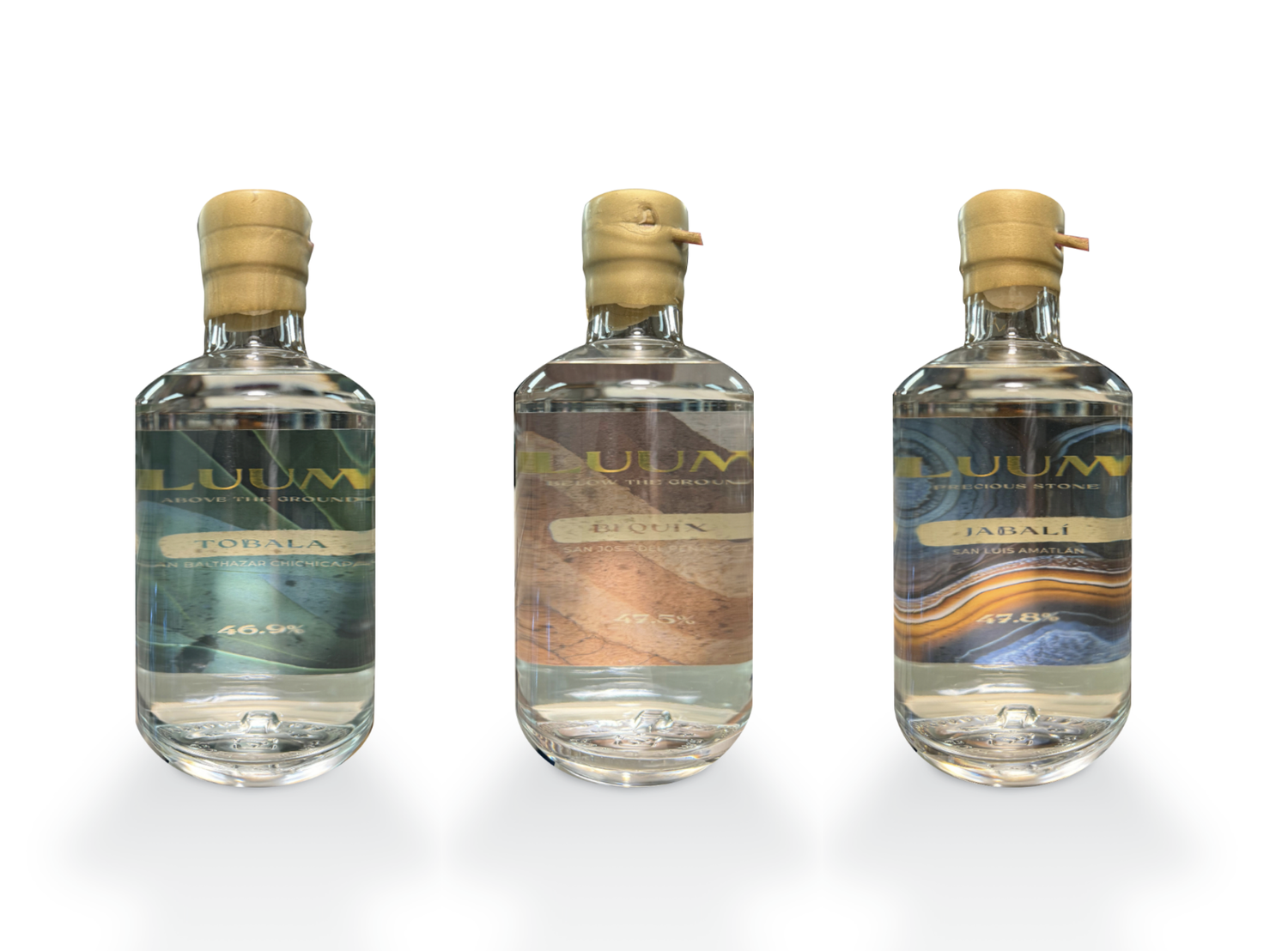 Three bottles of mezcal