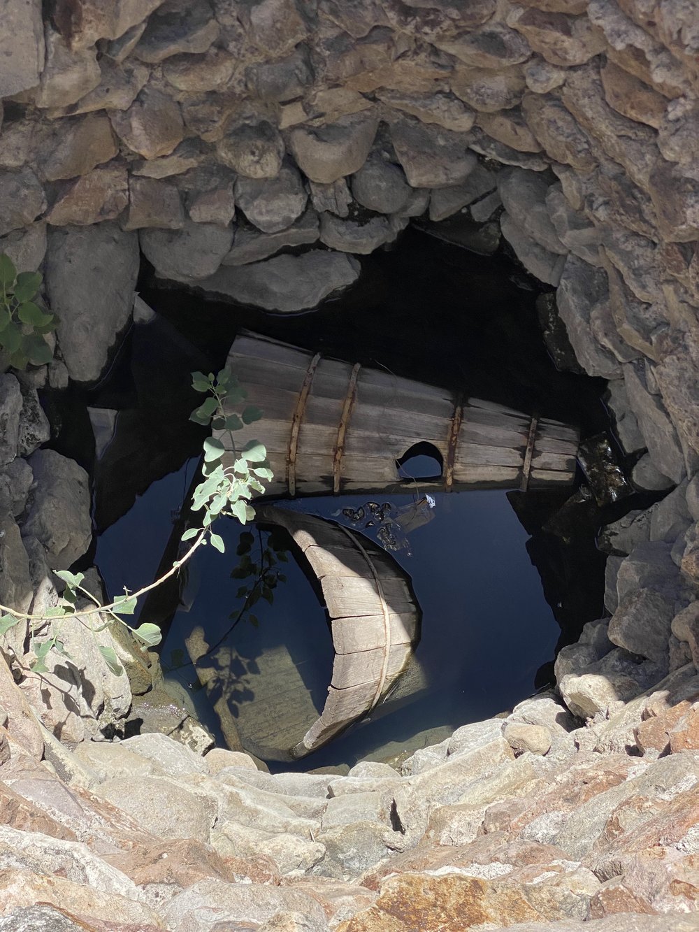 Wooden condensing chambers bathing in water so they do not dry out when not being used