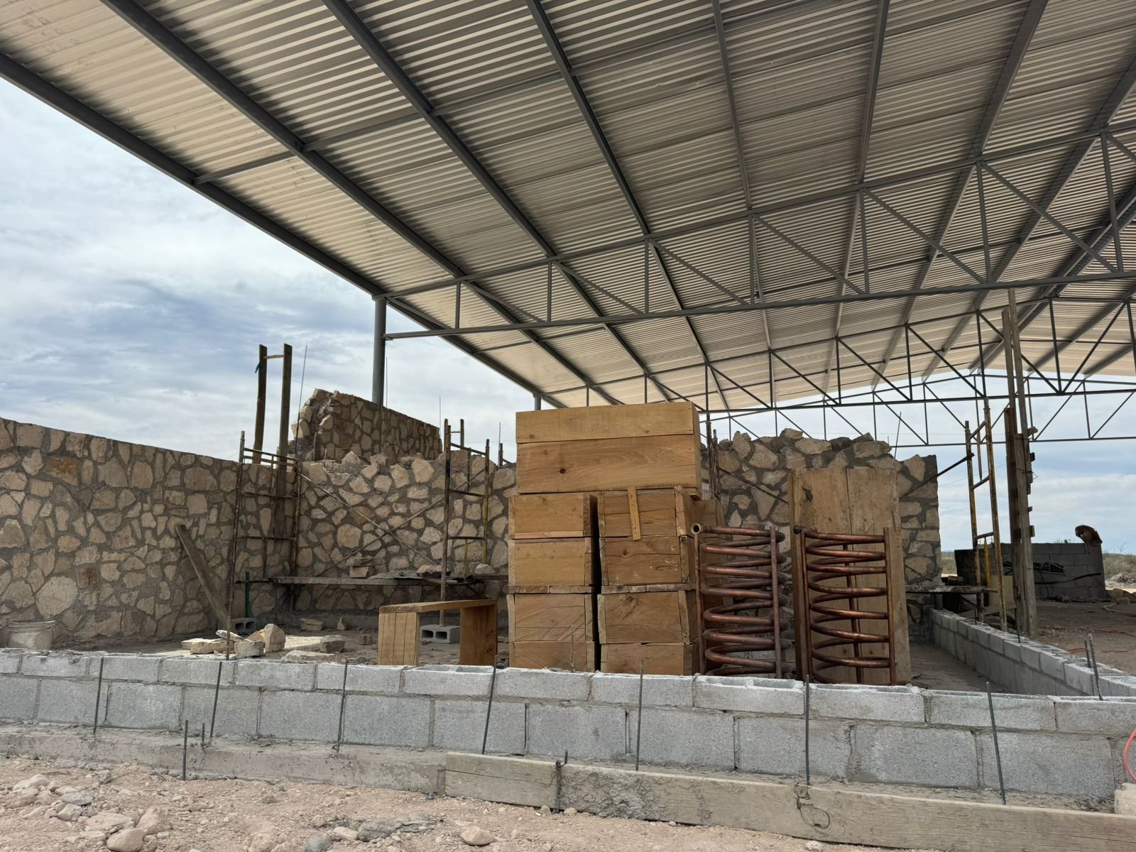 wooden condensing chambers of the stills are on site in Mexico for mezcal
