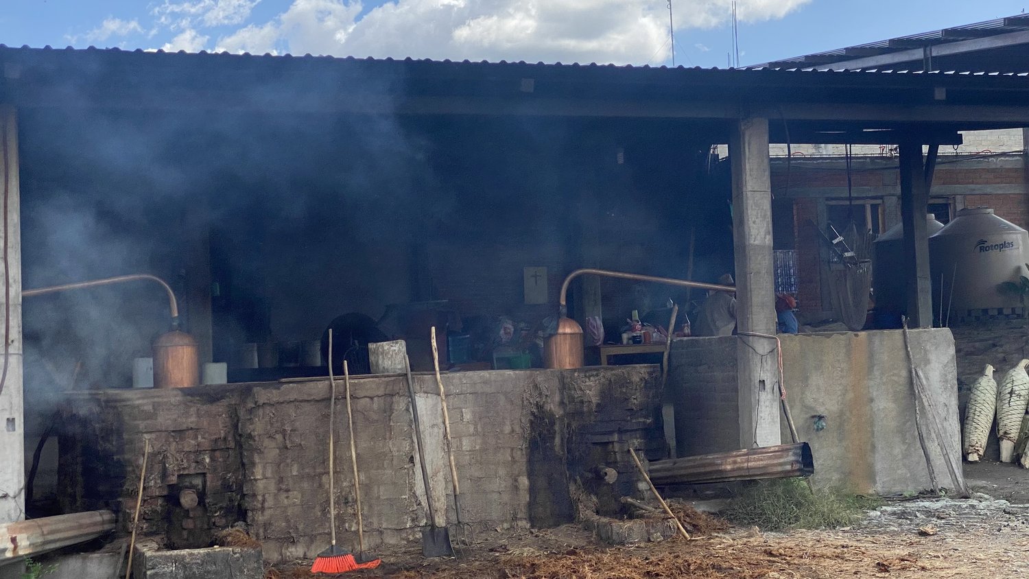A Mezcal distillery in Mexico with its copper pot still and oven beneath