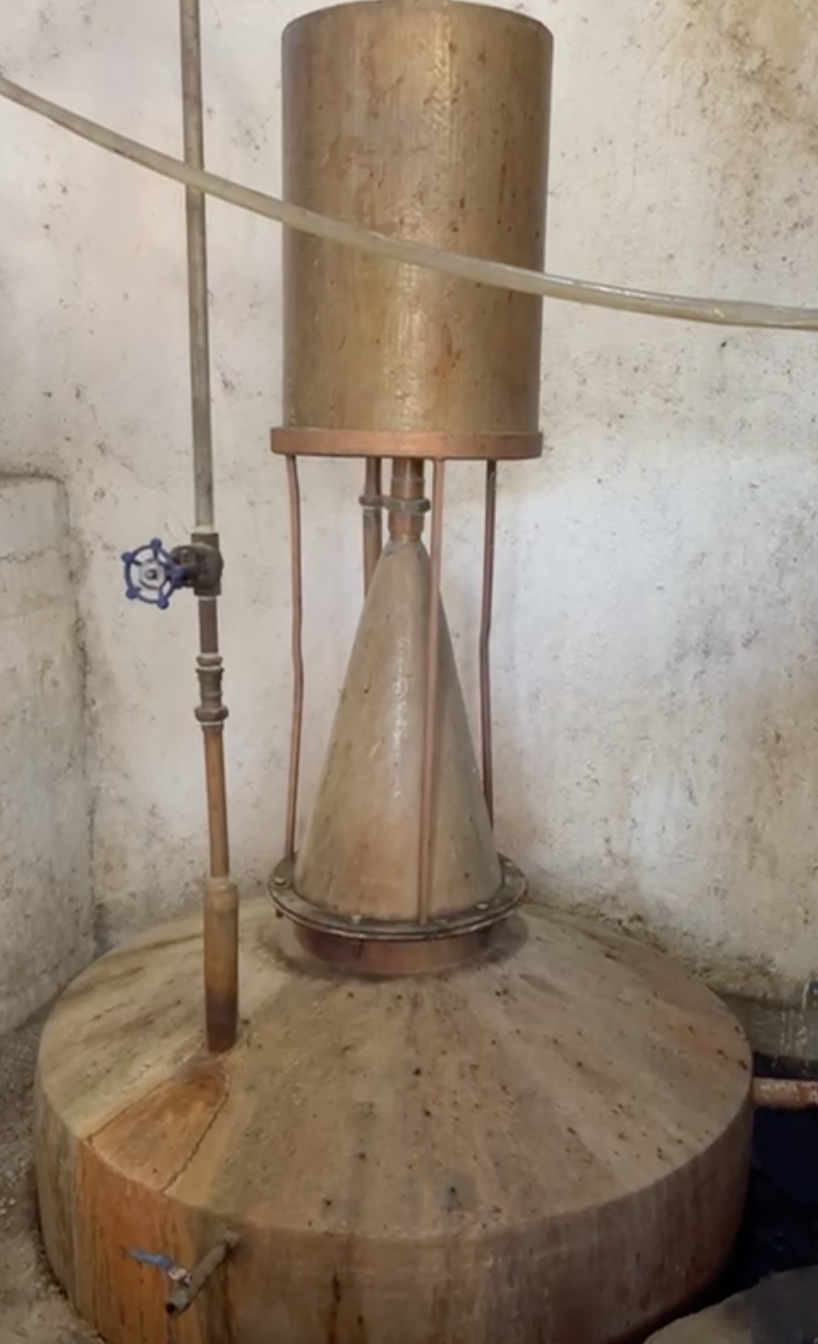 copper pot still used to make mezcal