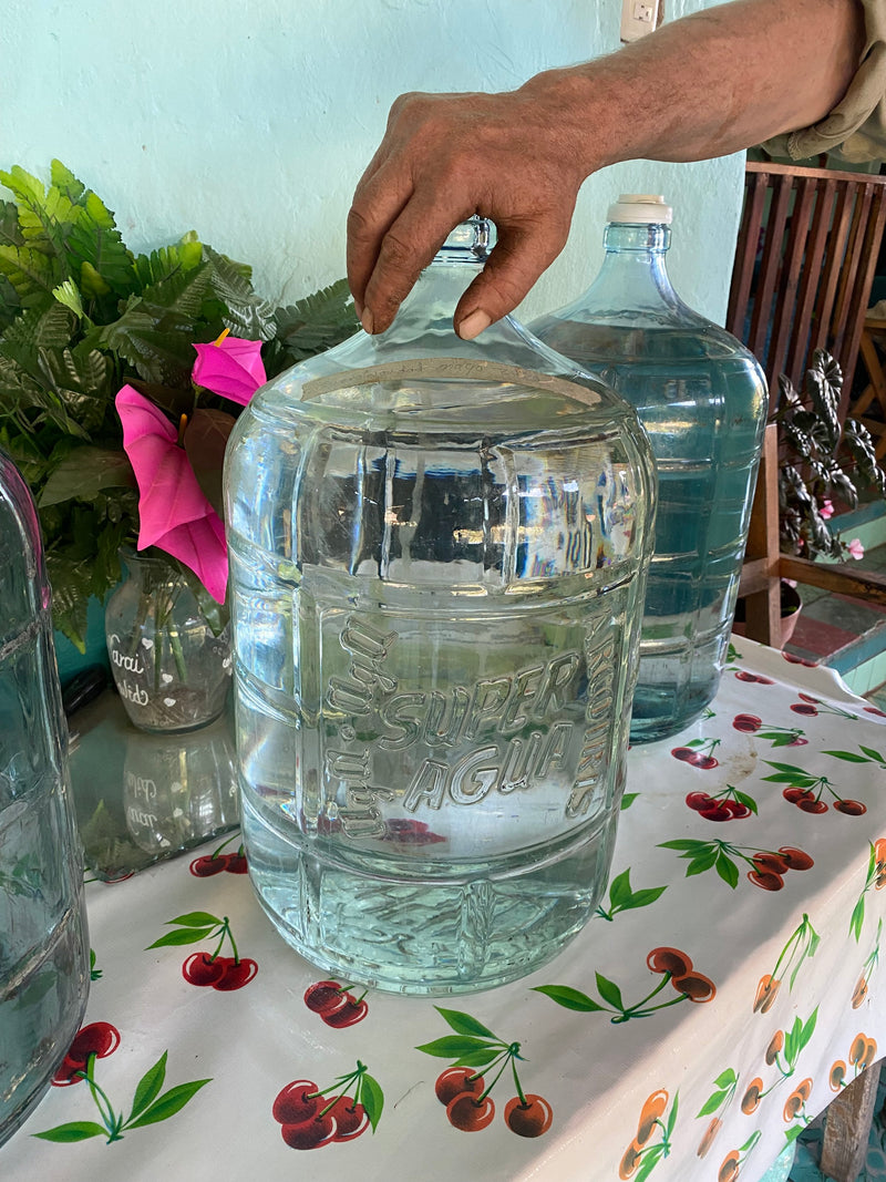 Sergio keeps all his batches in glass from the moment of distillation. As it happens, each 200 litre fermentation drum roughly fills a single 19 litre glass garrafon with finished raicilla
