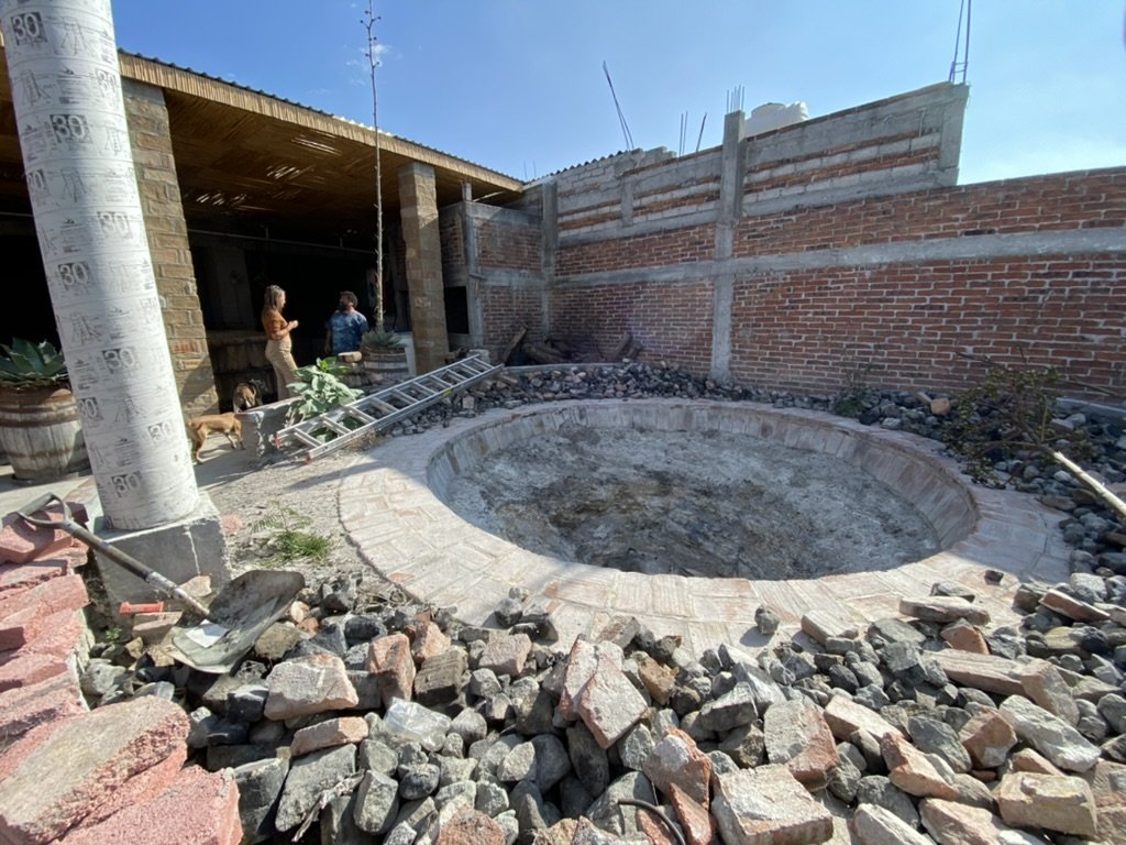 A huge outside oven used to cook pina's for mezcal