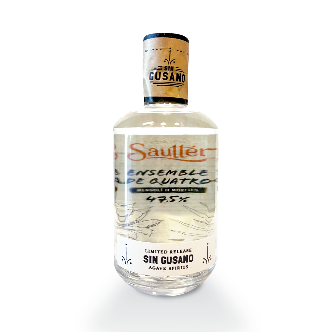 A bottle of the Ensemble De Quatro mezcal made for the Sin Gusano project in collaboration with Sautter cigars