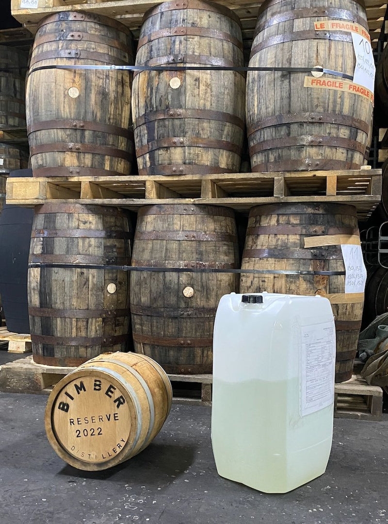 Unaged agave spirit going into the barrel for mezcal