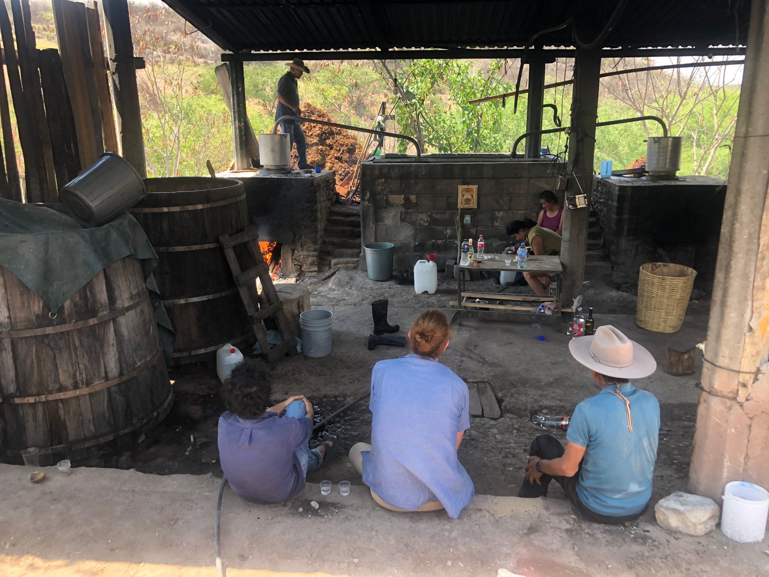 Jon Darby from the Sin Gusano project and a group of friends sat in Mexico waiting for MEzcal to be prepared for them to taste