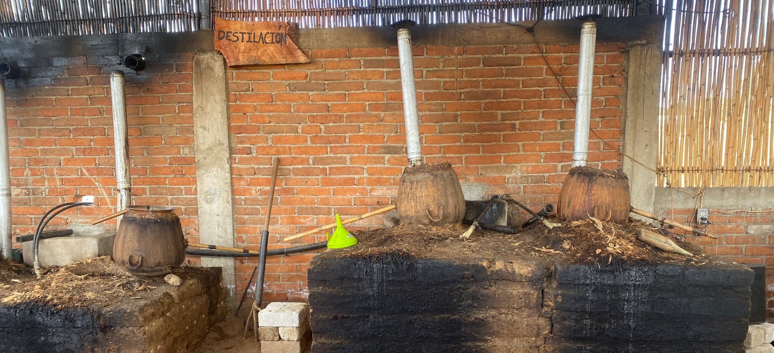 Traditional distillation for mezcal production 
